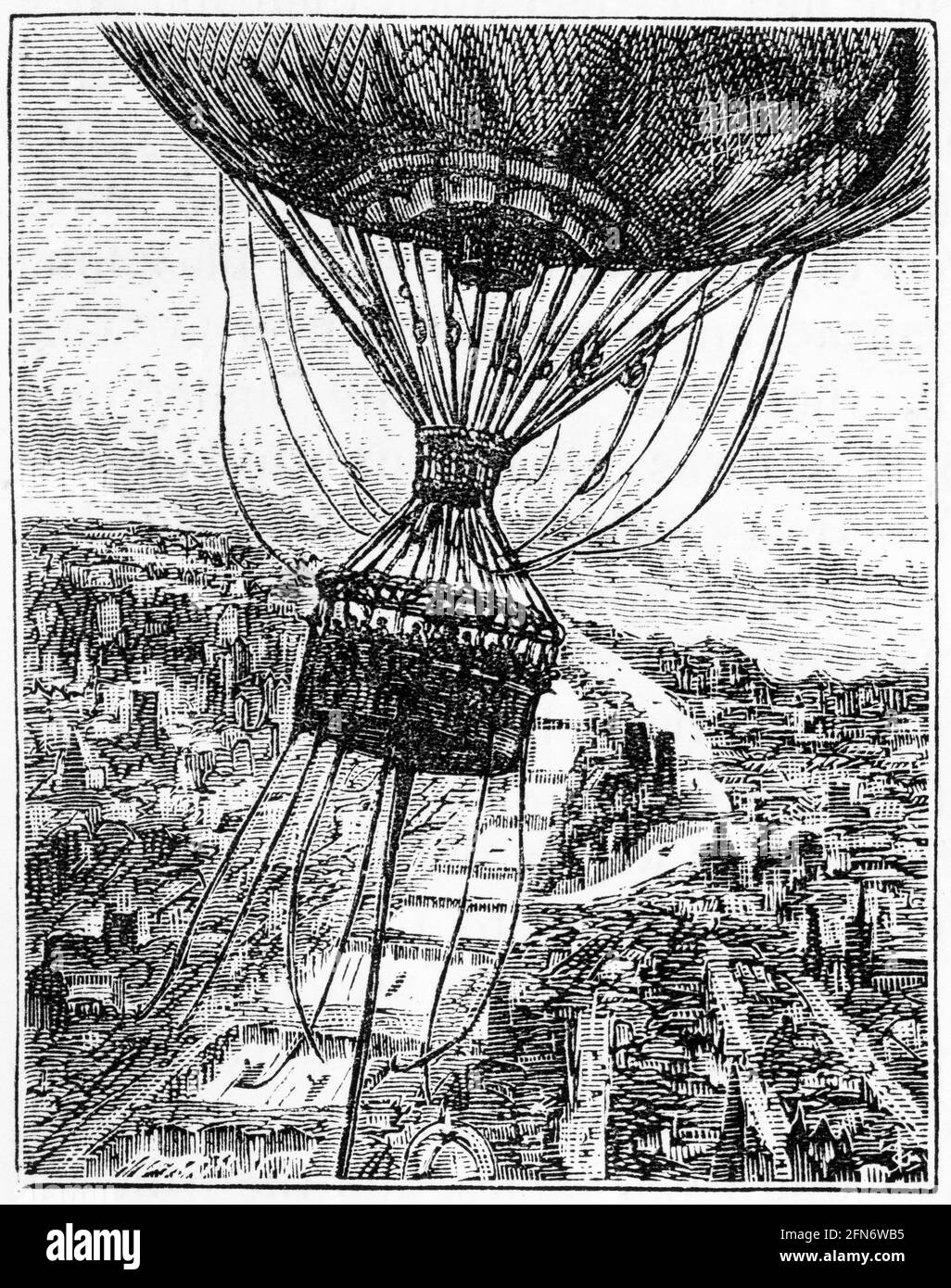 Engraving of passengers in the basket of a huge hot air balloon, circa 1879 Stock Photo