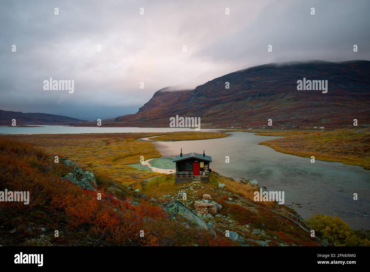 Alesjaure hut maintained by the Swedish Tourist organization, where you can stay overnight while hiking Kungsleden trail. September 2020. Stock Photo