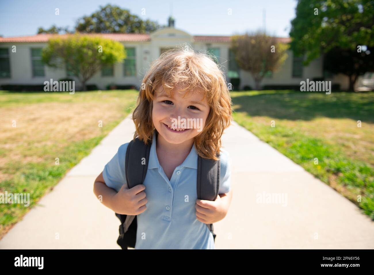 Funny happy school boy face. Back to school. Cute kid with backpack ...