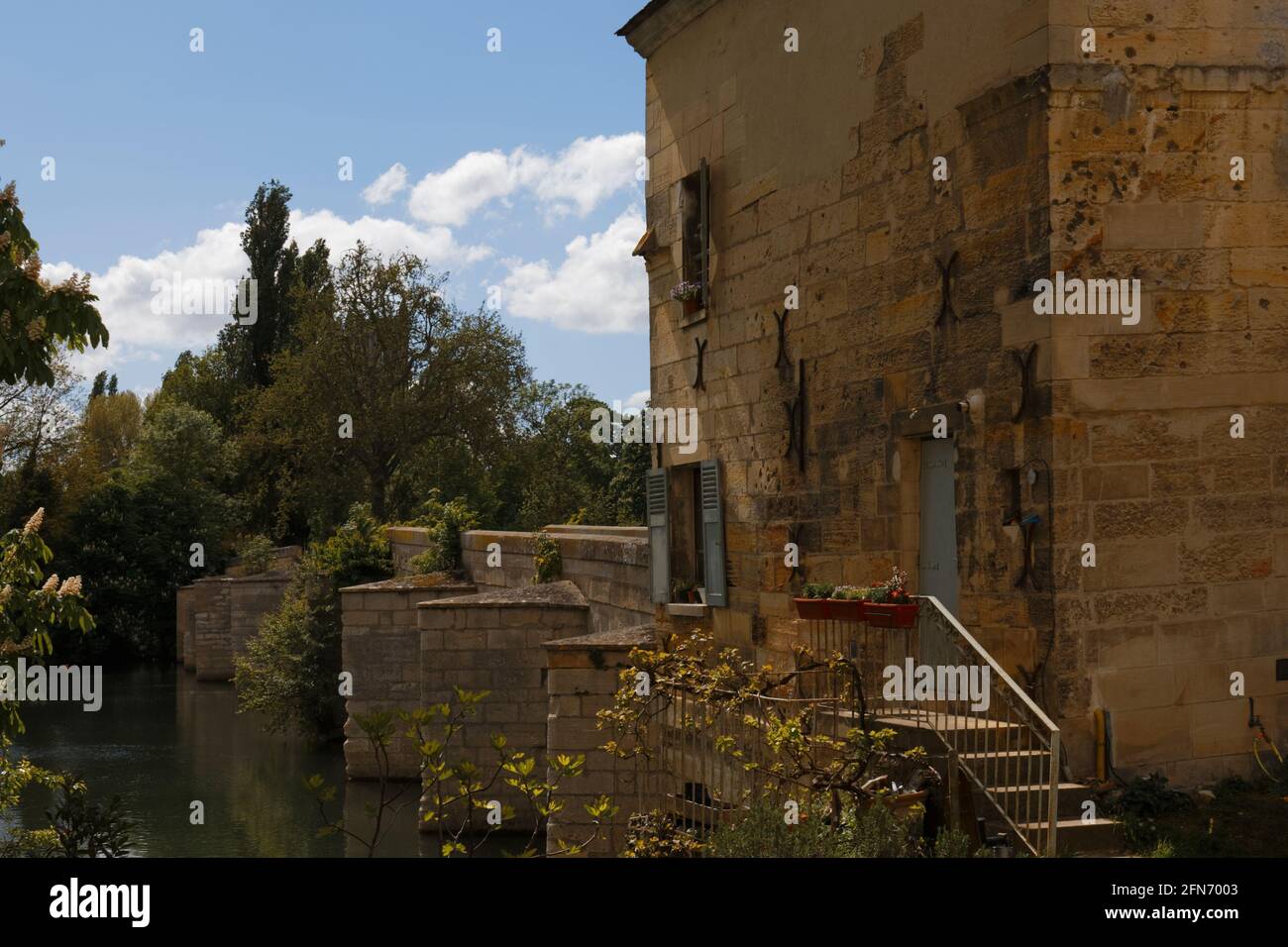The ferryman's house and the old bridge of Limay, Yvelines, France Stock Photo