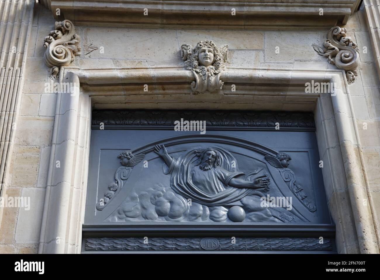 Bas-reilief sculpture outside the Museum of Hotel-Dieu, Mantes-la-Jolie, Yvelines, Ile-de-France, France Stock Photo