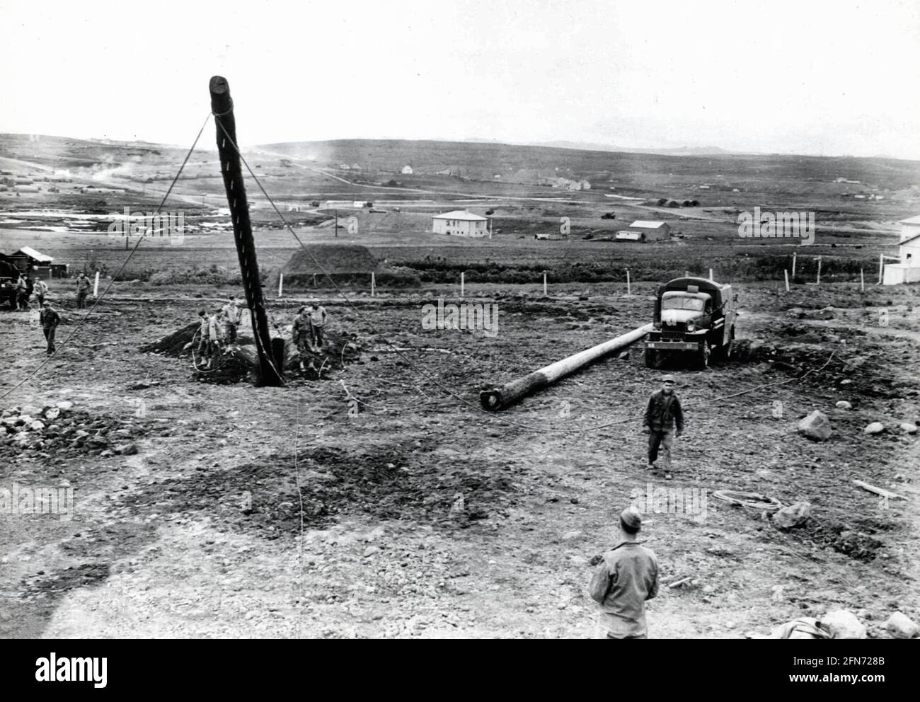 Erecting Signal Poles, Iceland during World War II Stock Photo