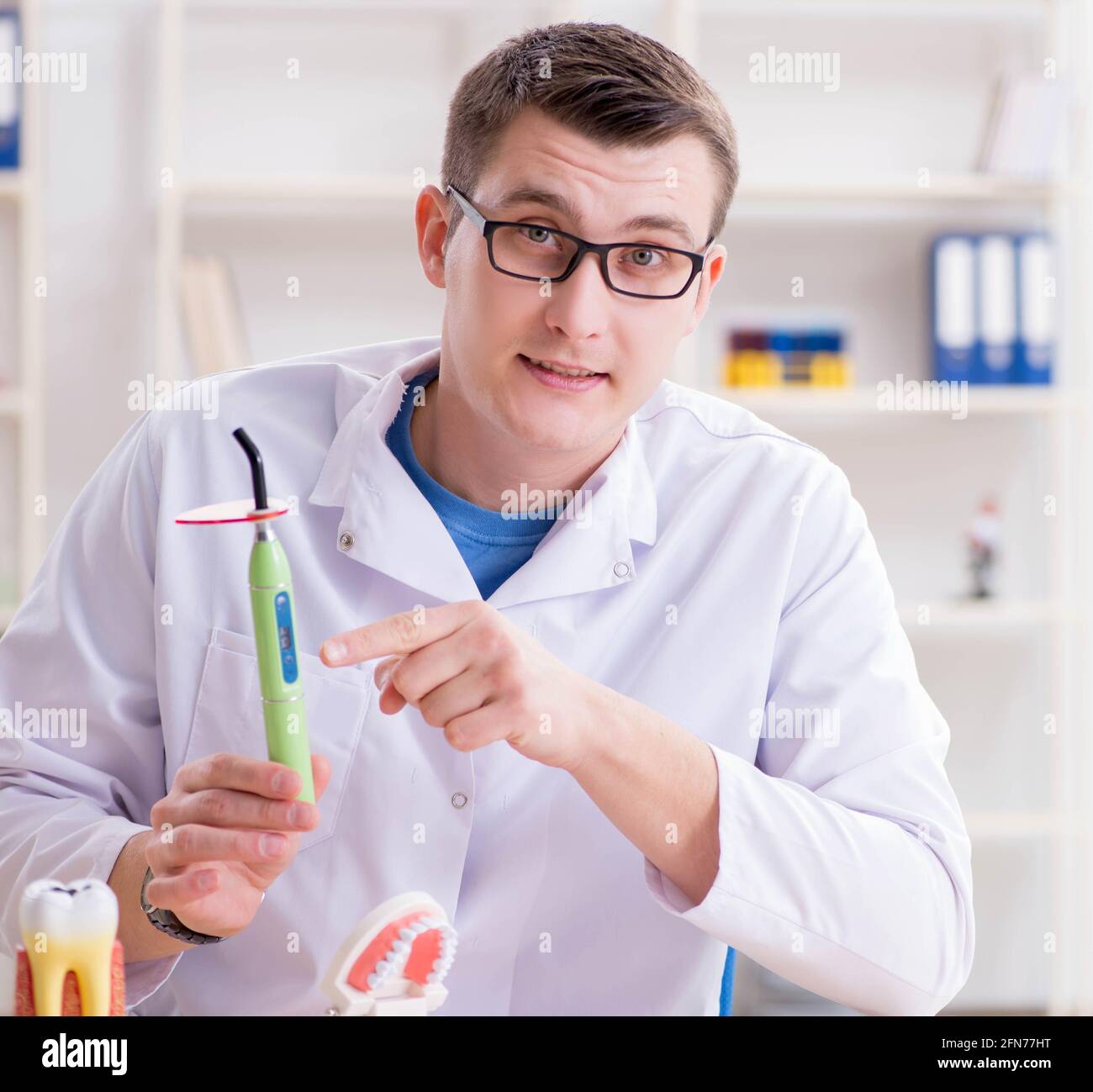 The dentist working teeth implant in medical lab Stock Photo Alamy