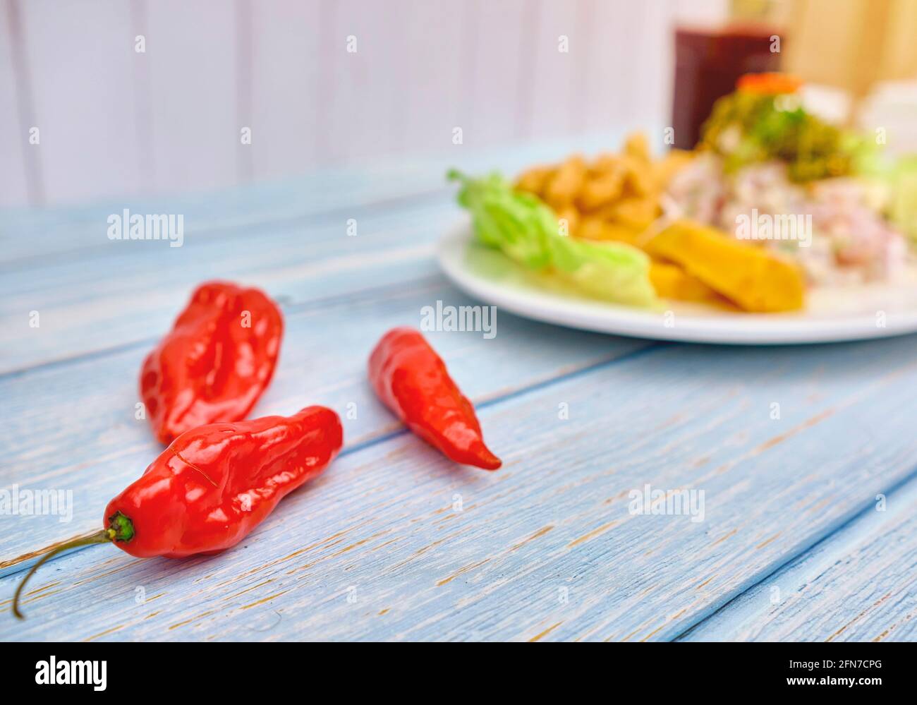 Peruvian food: fish ceviche and chicharron de pescado with fried ...