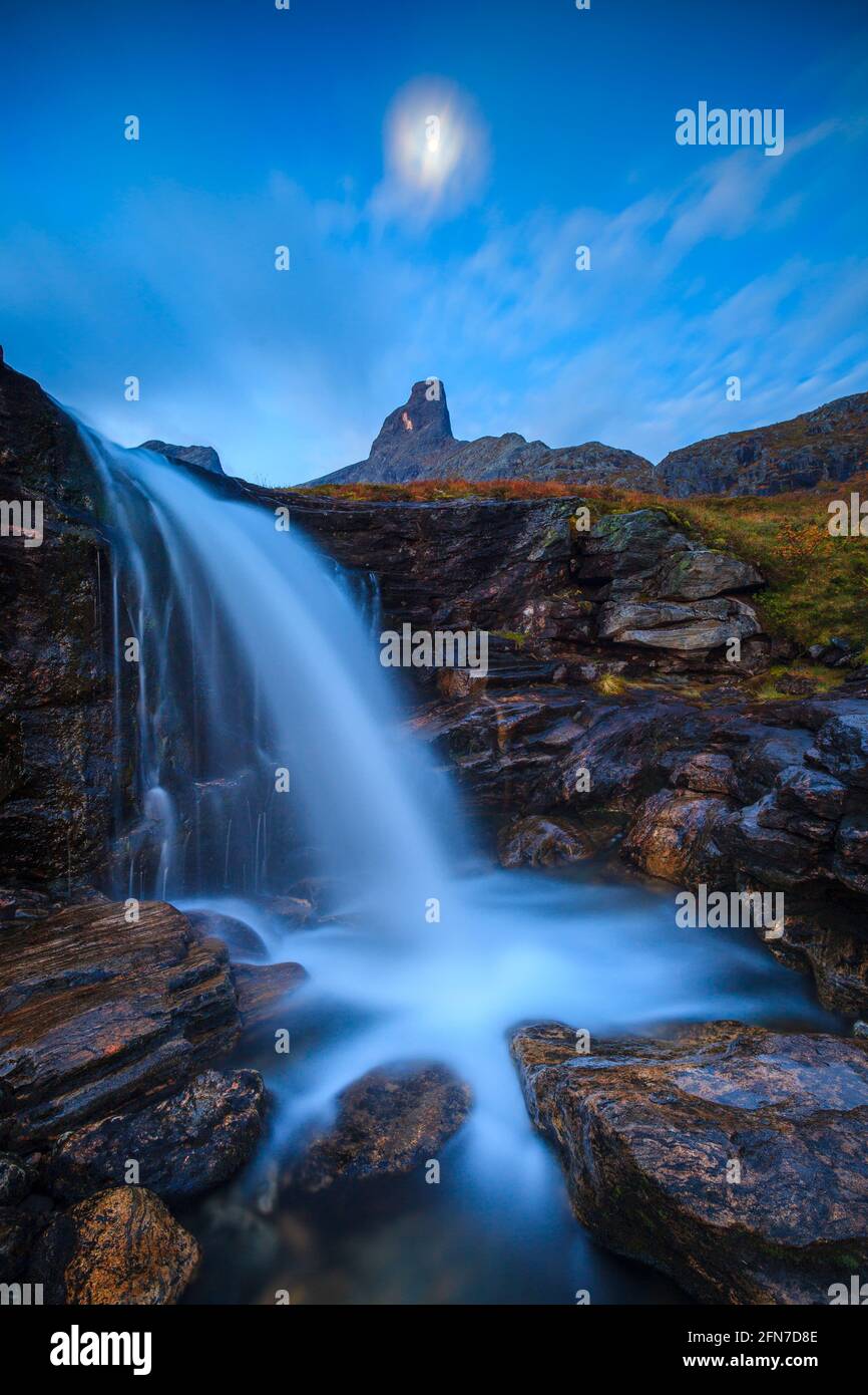 Beautiful waterfall under the mountain Romsdalshorn, 1550 m, in Vengedalen, Rauma kommune, Møre og Romsdal, Norway, Scandinavia. Stock Photo
