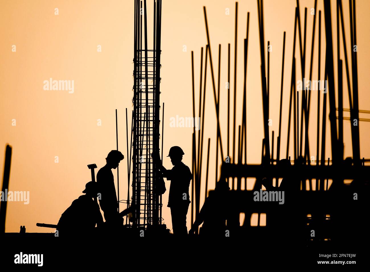 construction worker silhouette on the work place Stock Photo