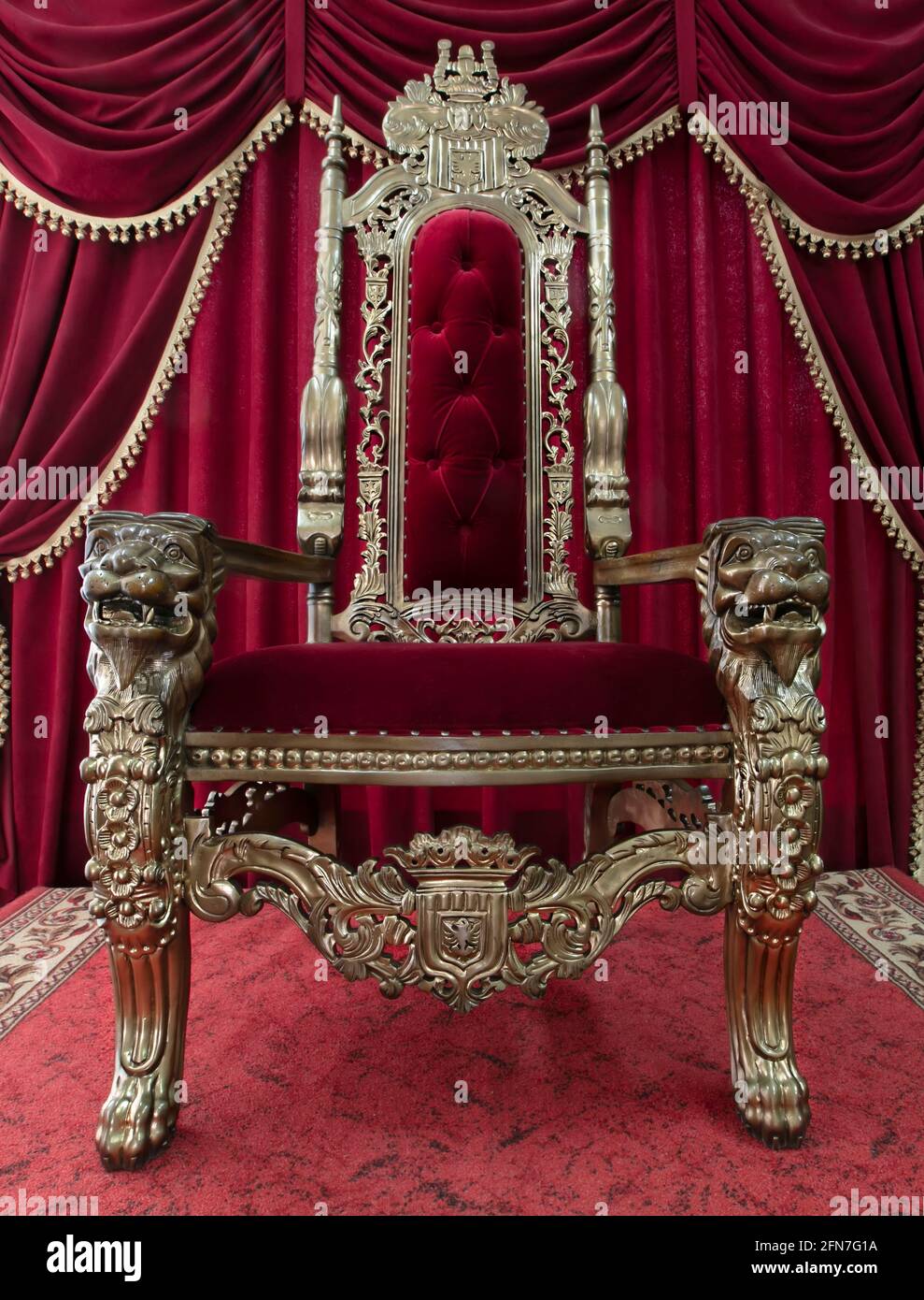 Red royal chair on a background of red curtains. Place for the king. Throne  Stock Photo - Alamy
