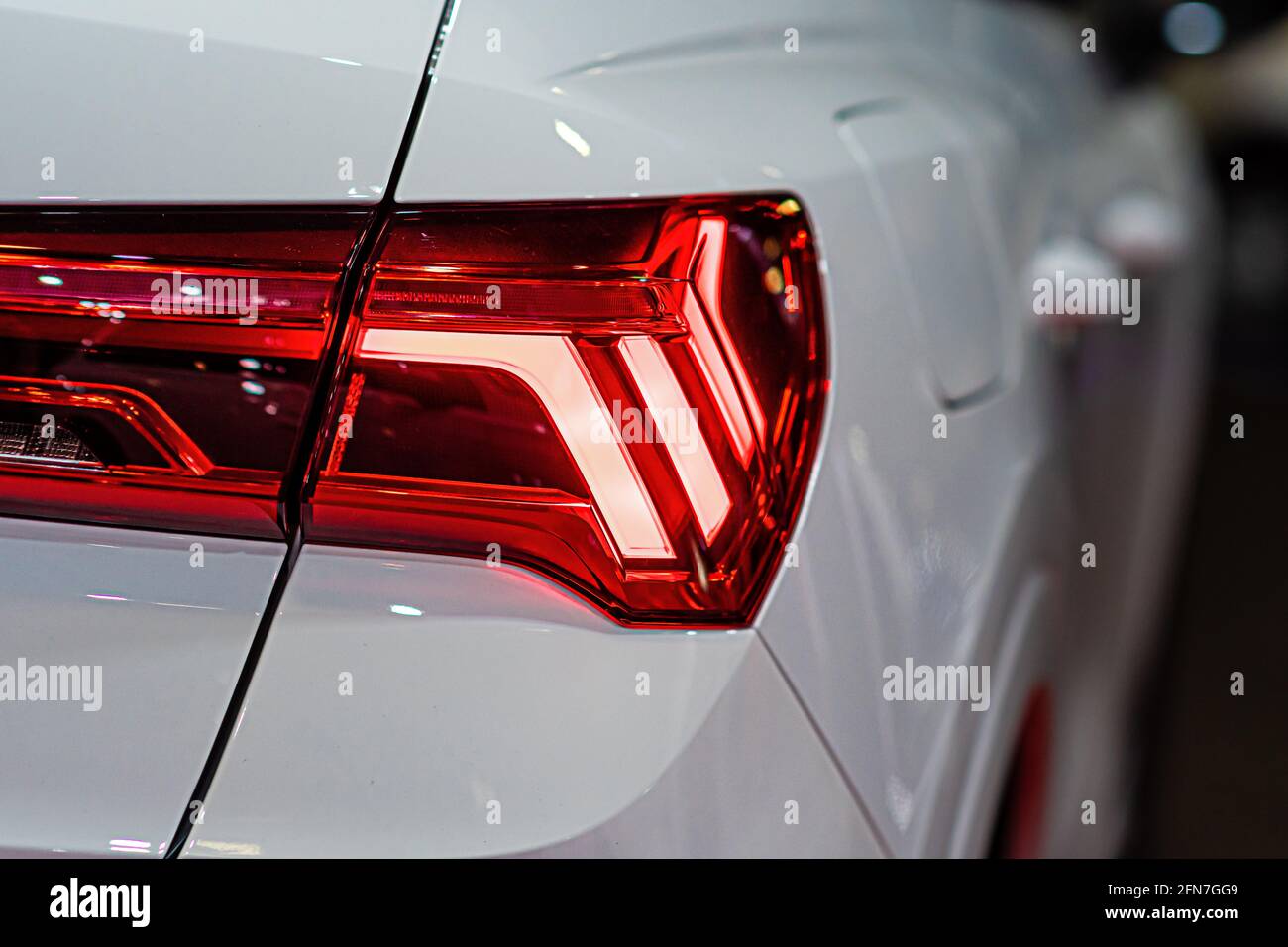 close-up of a red led taillight on a modern car, detail on the rear ...