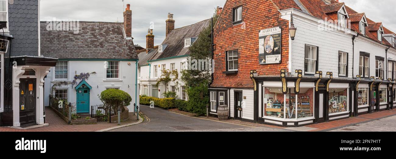 LEWES, EAST SUSSEX, UK - APRIL 29, 2012:  Panorama view of the High Street and Harvey's Brewery Shop, Stock Photo