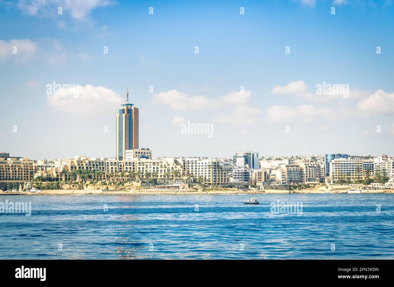 Skyline of Paceville at St Julians from the sea - Touristic nightlife place in the island of Malta near La Valletta - Mediterranean tourism travel Stock Photo