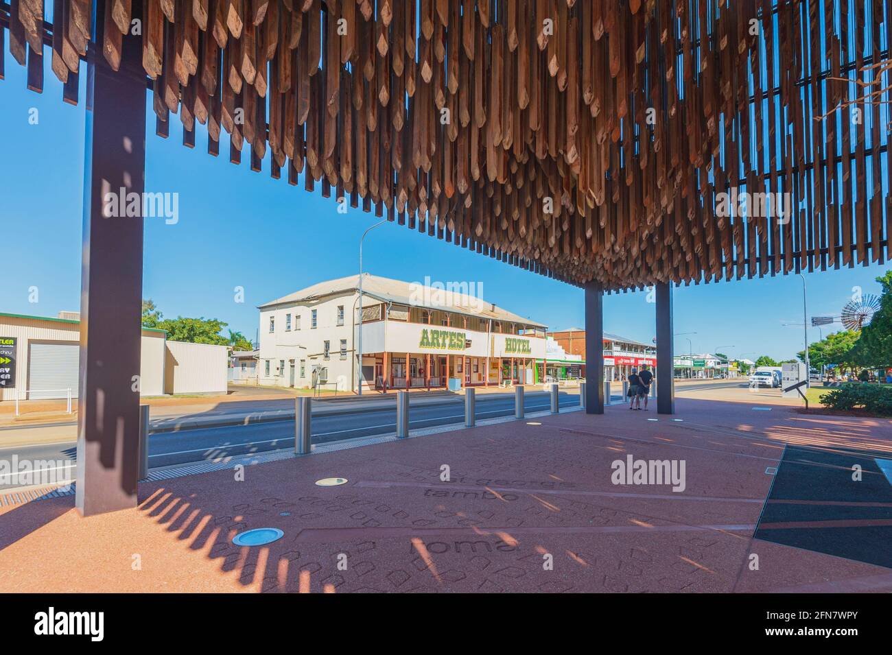 Memorial of the Tree of Knowledge with the Artesian Hotel in the background, Barcaldine, Queensland, QLD, Australia Stock Photo
