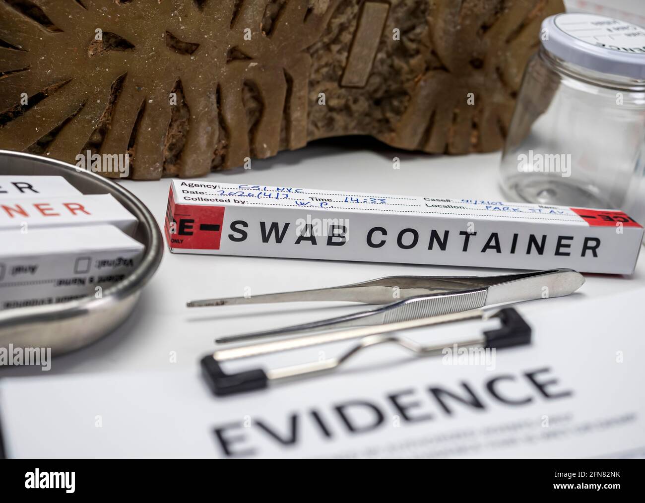 Shoe particle trace samples in crime lab, homicide investigation, concept image Stock Photo