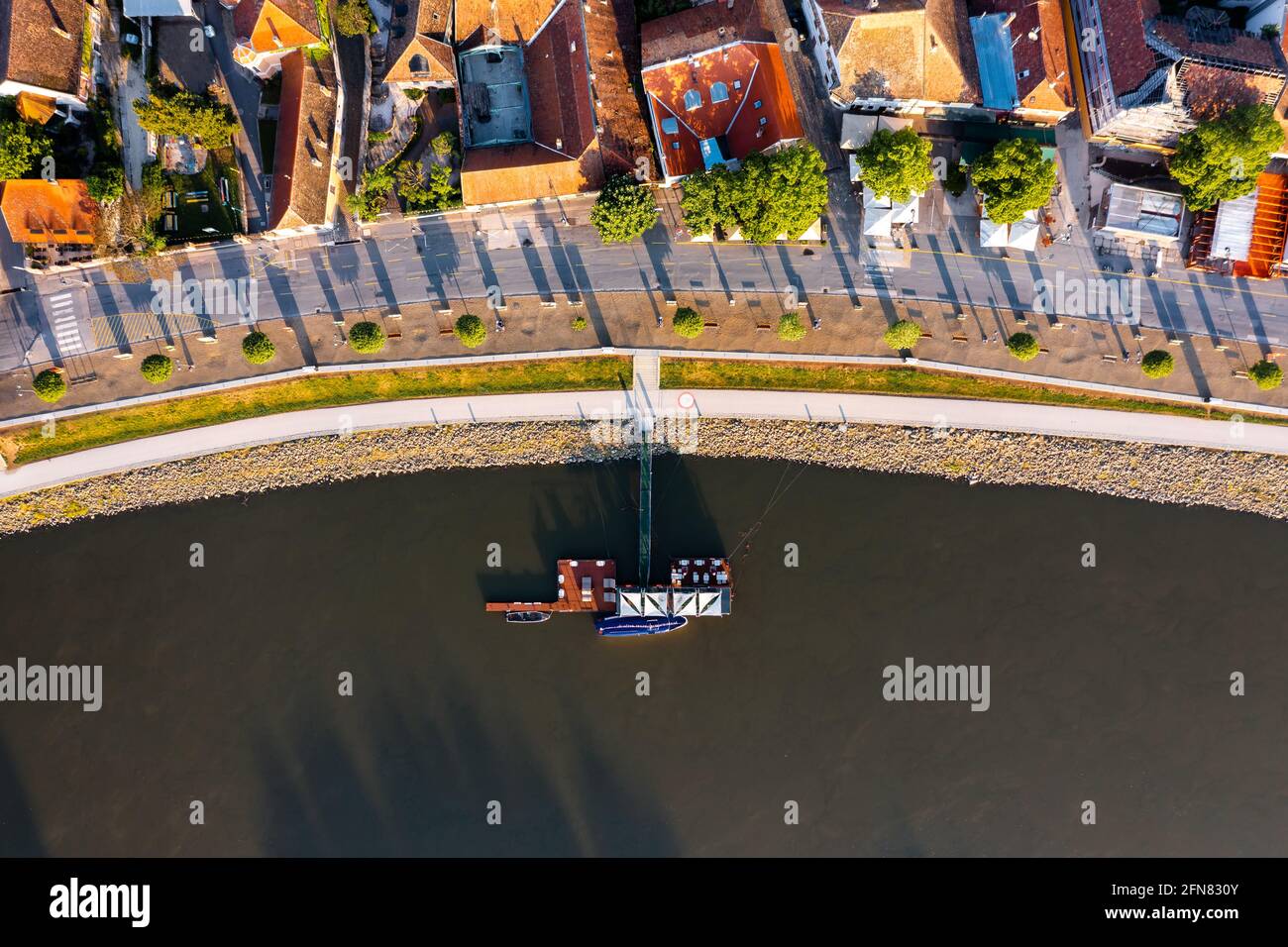 Top down view about a part of Szentendre city in Hungary. Amazing aerial shot of the church. Famous tourist attraction is the Danube riverside walkway Stock Photo