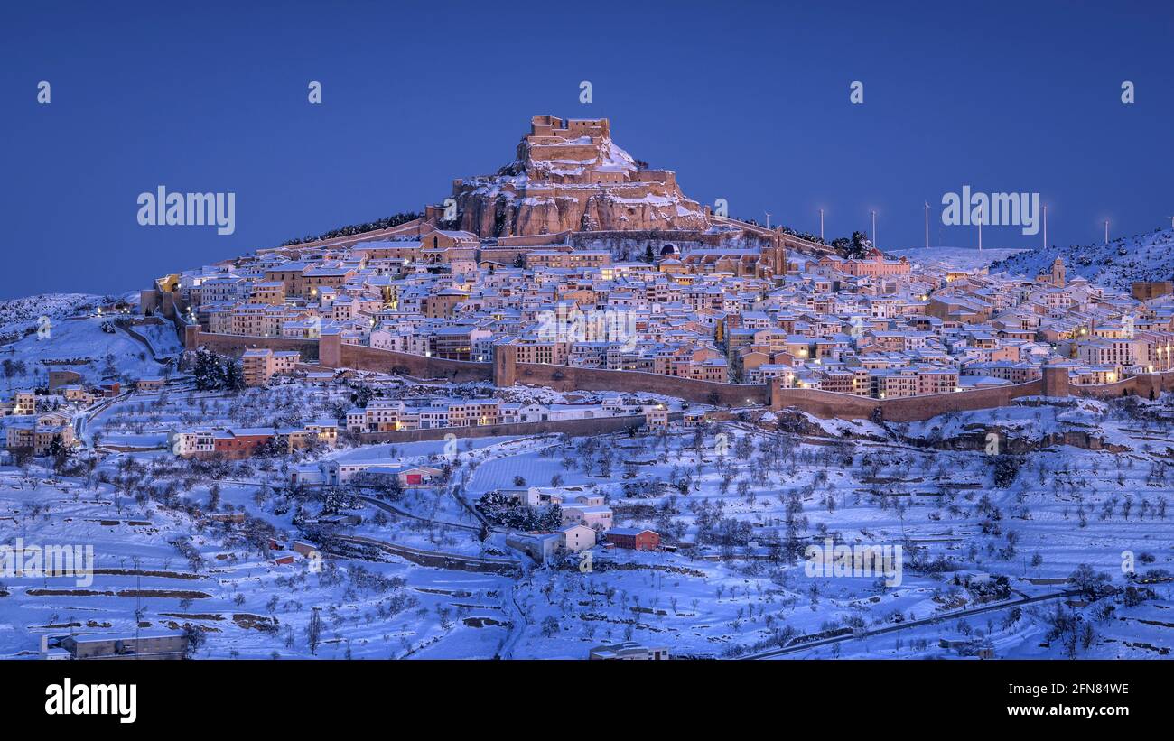 Morella medieval city in a winter blue hour, after a snowfall (Castellón province, Valencian Community, Spain) ESP: Vista de la ciudad de Morella Stock Photo