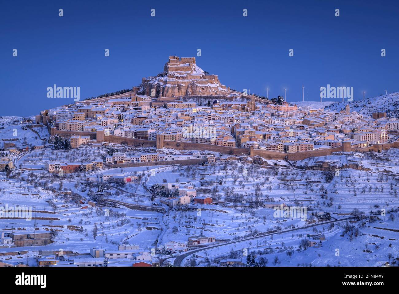 Morella medieval city in a winter blue hour, after a snowfall (Castellón province, Valencian Community, Spain) ESP: Vista de la ciudad de Morella Stock Photo