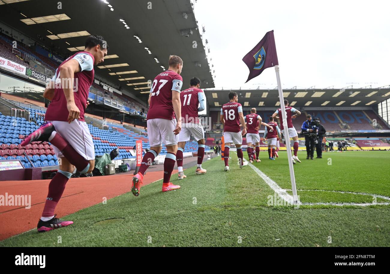 Burnley players enter the pitch for the Premier League match at Turf Moor, Burnley. Picture date: Saturday May 15, 2021. Stock Photo