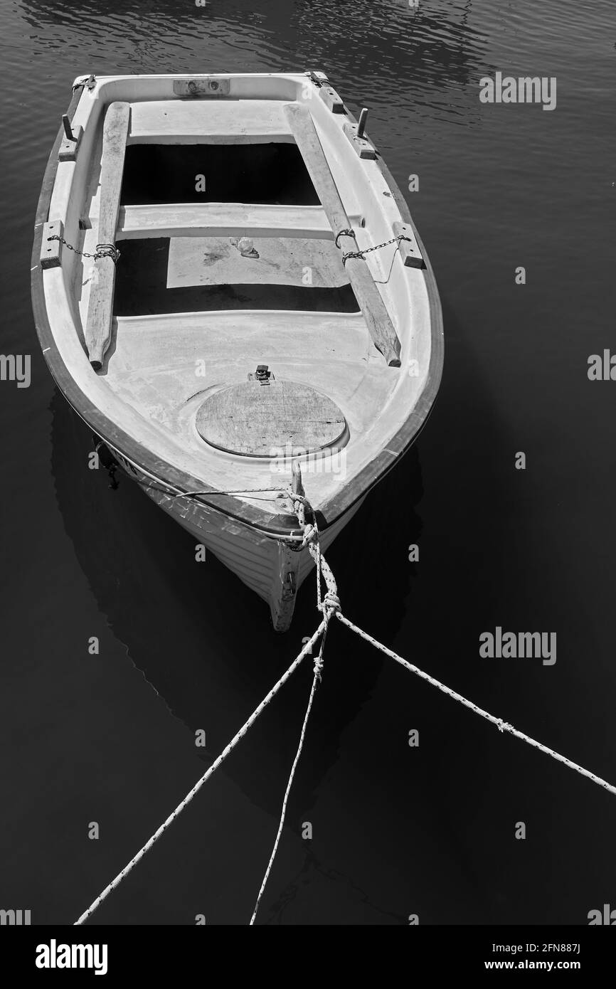 Old fishing boat moored Black and White Stock Photos & Images - Alamy