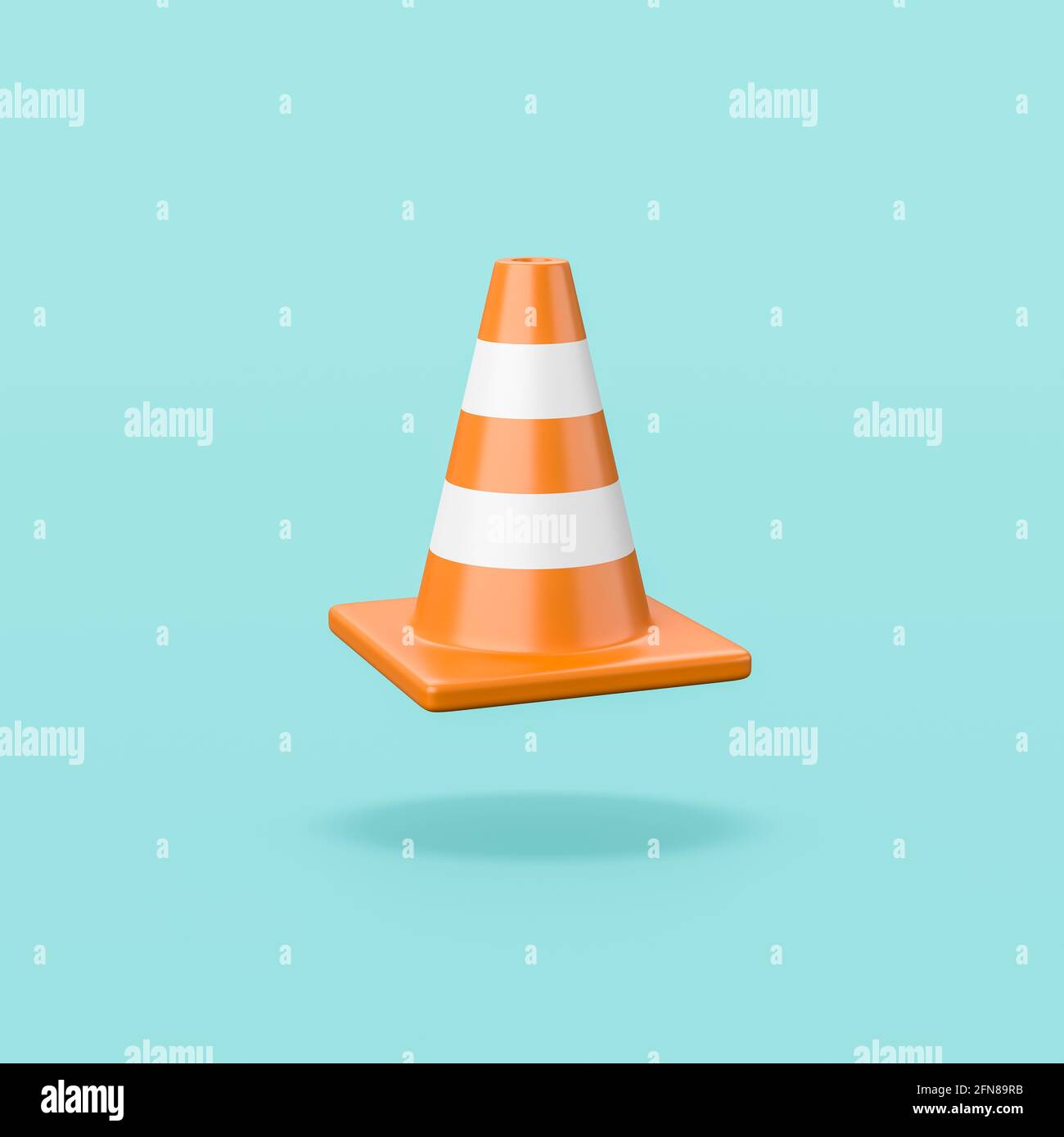 Traffic Cone on Blue Background Stock Photo