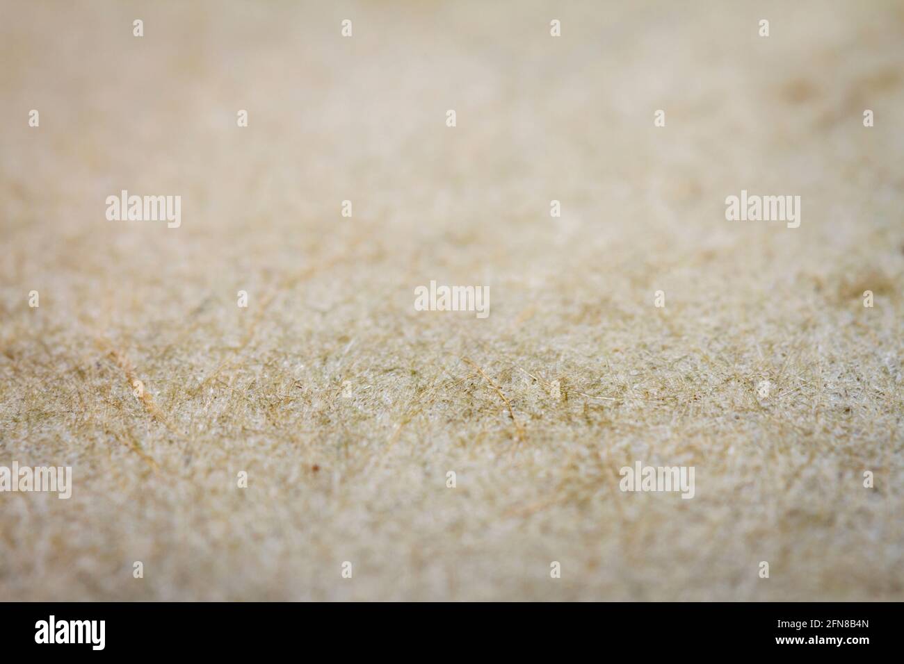 Extreme closeup of handmade paper with shallow deph of field. Stock Photo