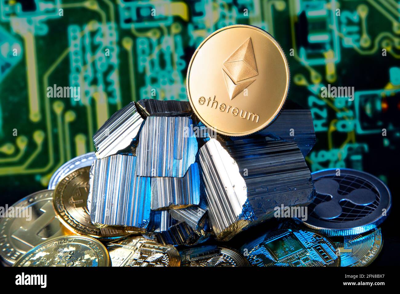 Cryptocurrency ethereum (ether) coin on a mineral rock - crypto mining concept Stock Photo