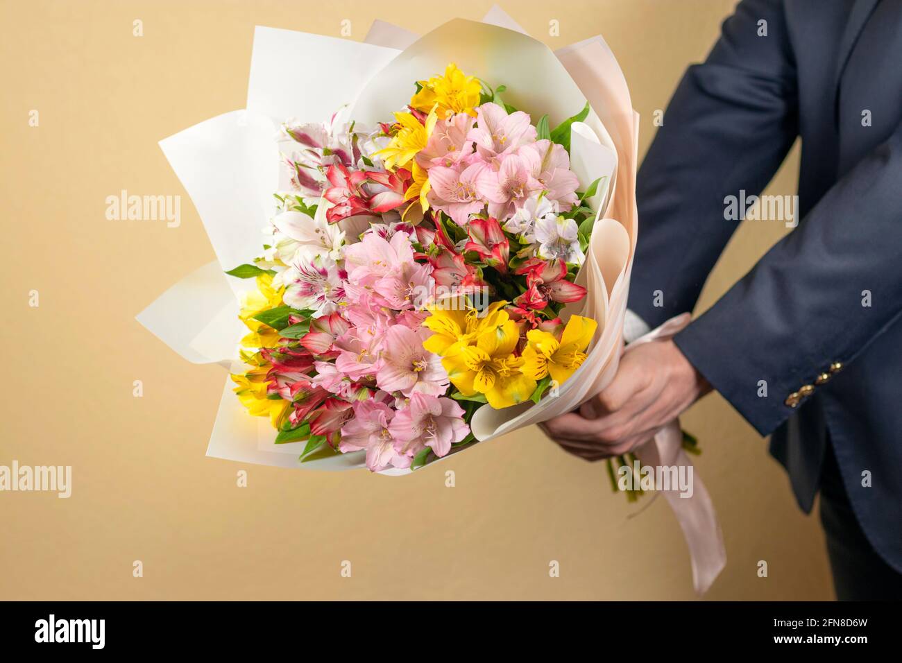 Red and yellow suit hi-res stock photography and images - Alamy