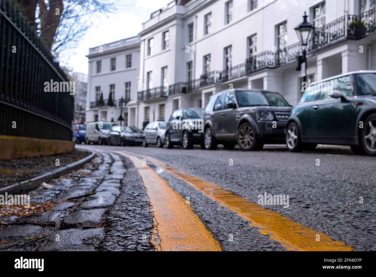 London- May 2021: Residential street of west London townhouses Stock Photo