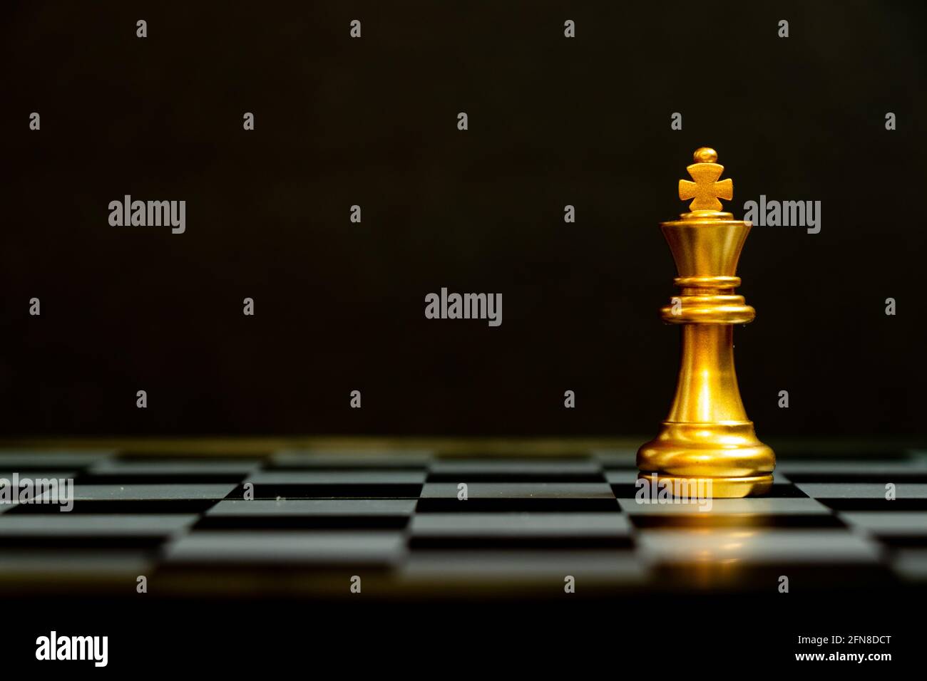 Gold king chess piece stand on black background with copy space (Concept  for leadership, unique Stock Photo - Alamy