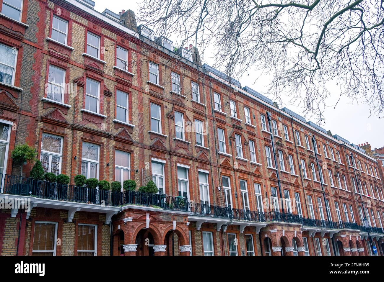 Street of upmarket London townhouses in Earls Court area of Kensington Stock Photo