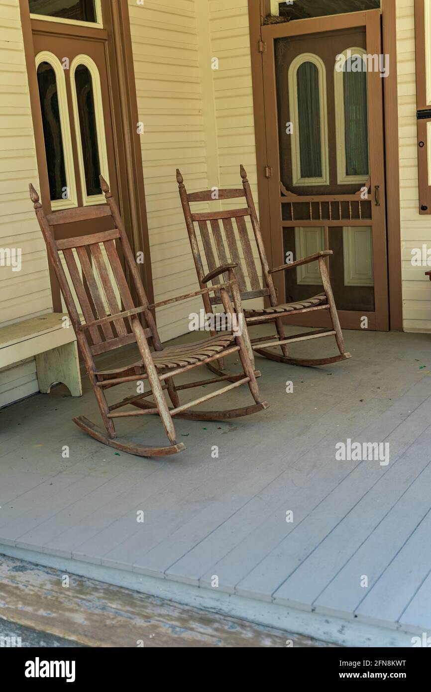 A pair of rocking chairs on a country porch. Stock Photo