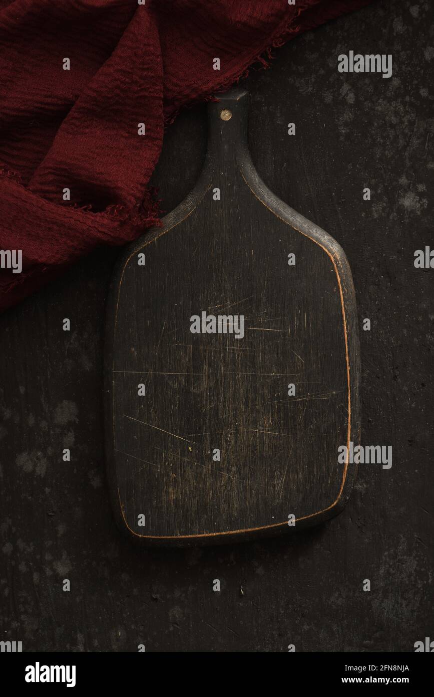 Dark Black Strawberry Cranberry In Bowl Food Flat Lay with Cutting Board and Cloth Stock Photo