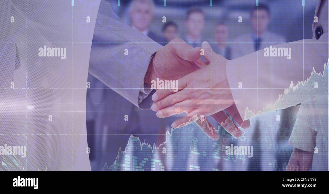 Composition of financial data processing over businessman handshake Stock Photo