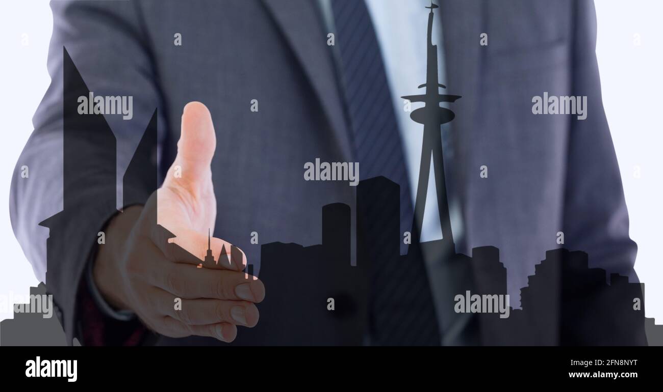Animation of businessman holding hand over cityscape Stock Photo