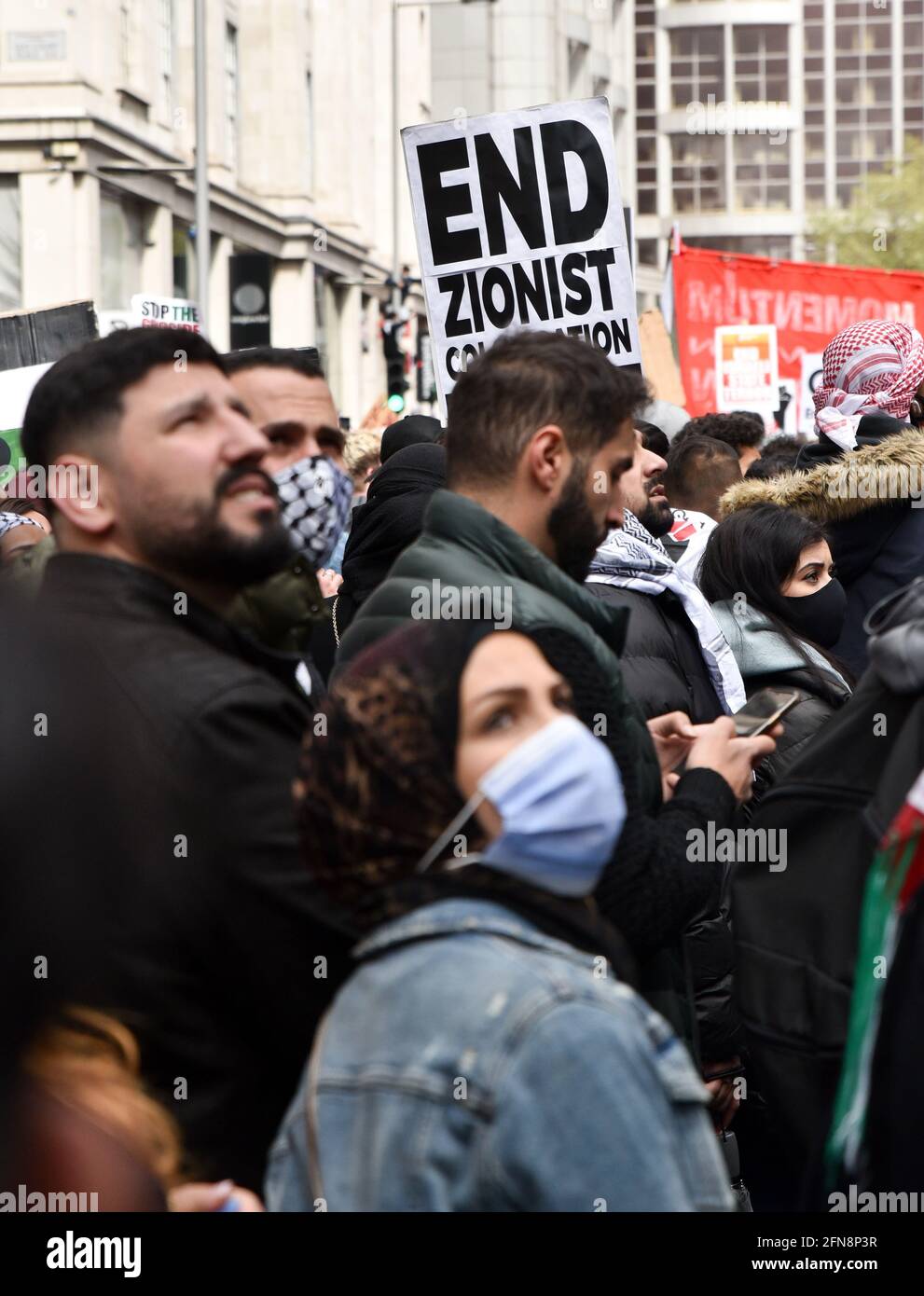 High Street Kensington, London, UK. 15th May 2021. Supporters of Palestine at the March for Palestine outside the Israel Embassy in London. Credit: Matthew Chattle/Alamy Live News Stock Photo