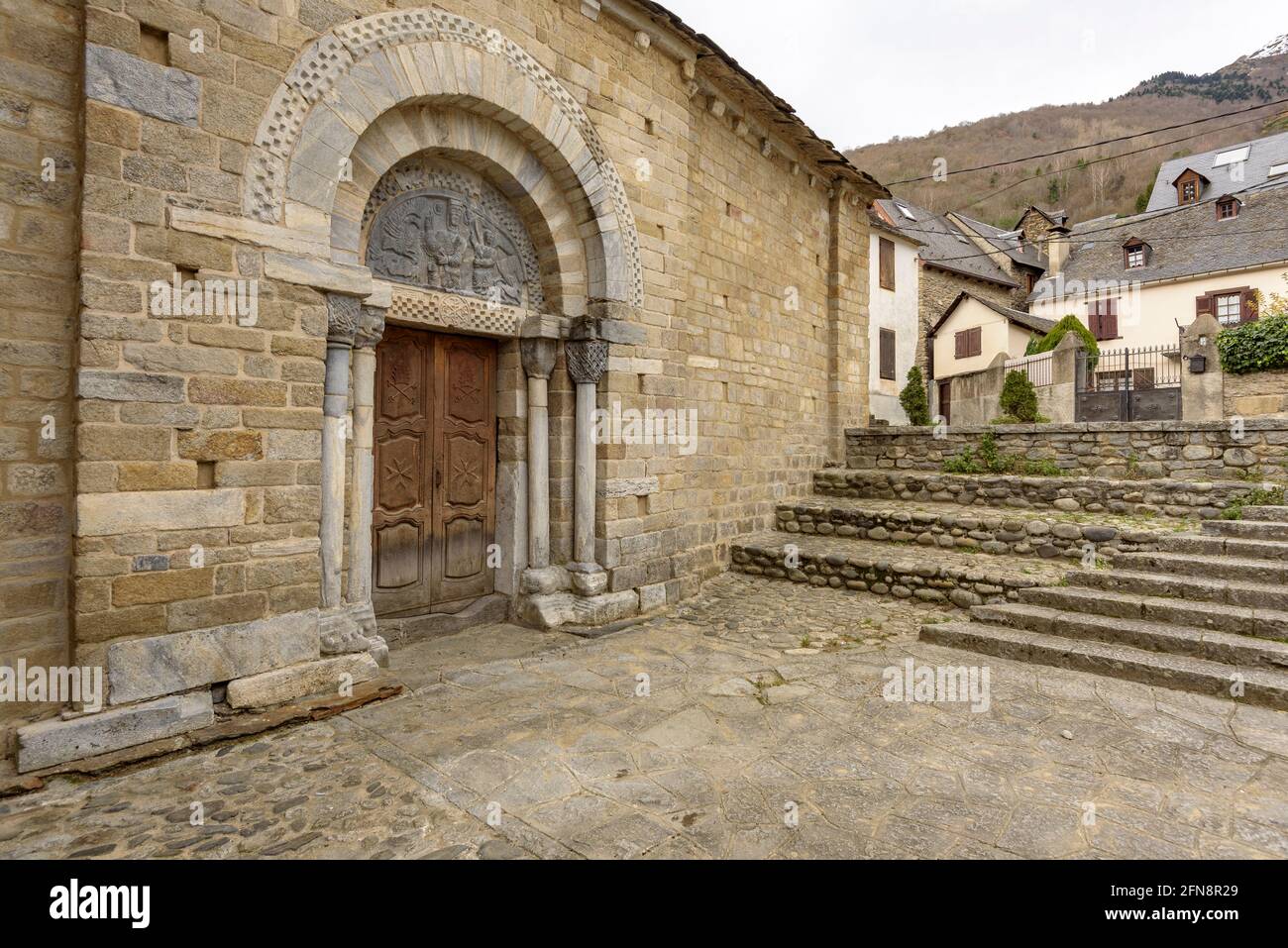 Exterior of the Purification Church of Bossòst (Aran Valley, Catalonia, Spain, Pyrenees) ESP: Exterior de la iglesia de la Purificación de Bossòst Stock Photo