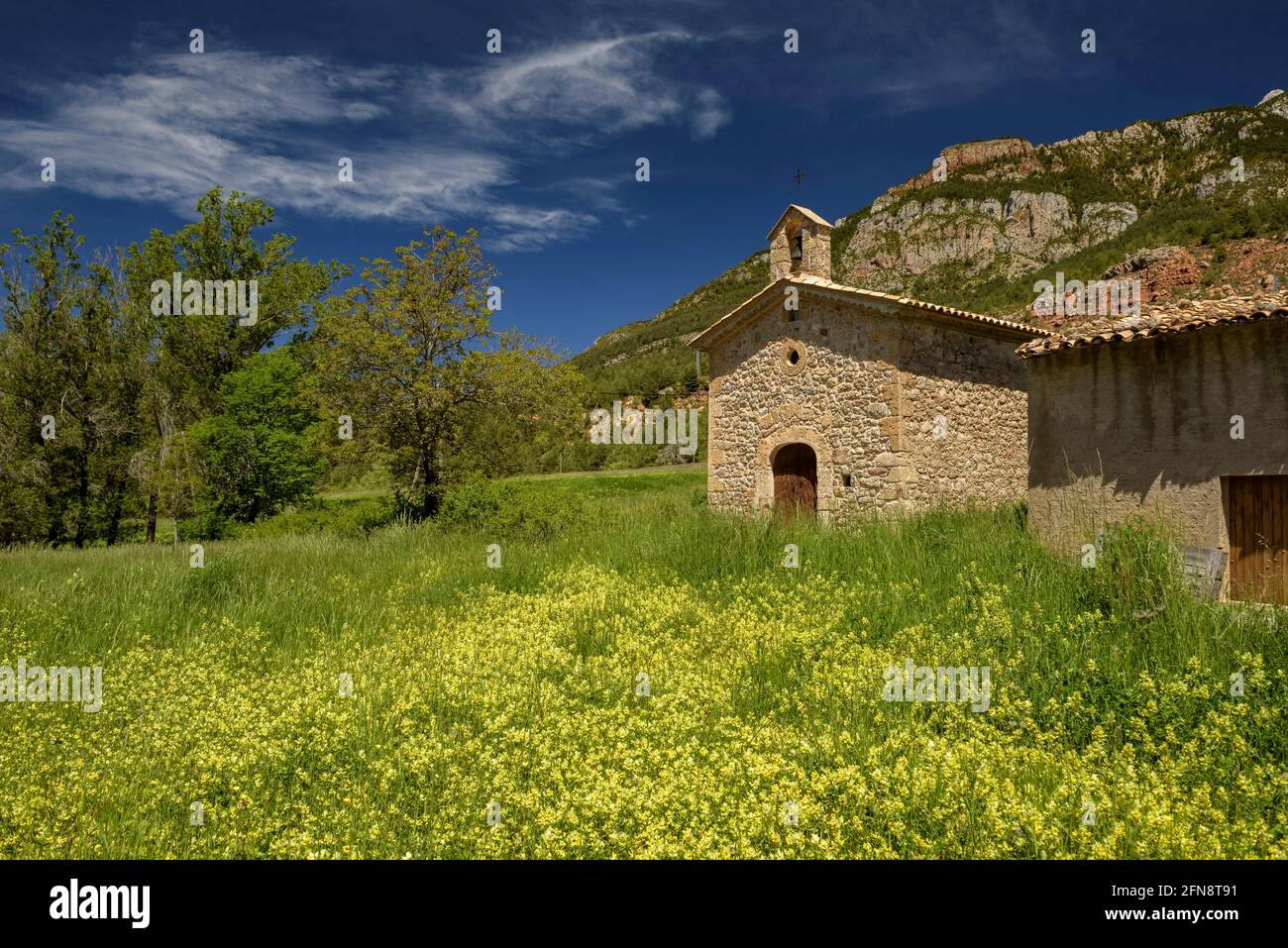 Hermitage of Sant Antoni de Feners, in the base of the Pedraforca south face (Berguedà, Catalonia, Spain) ESP: Ermita de Sant Antoni de Feners Stock Photo