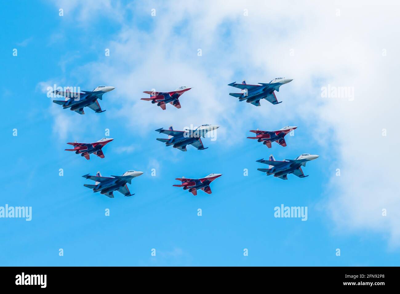 May 7, 2021, Moscow, Russia. The Cuban Diamond formation consists of MiG-29 and Su-30SM fighters of the Russian Knights and Strizhi aerobatic teams ov Stock Photo