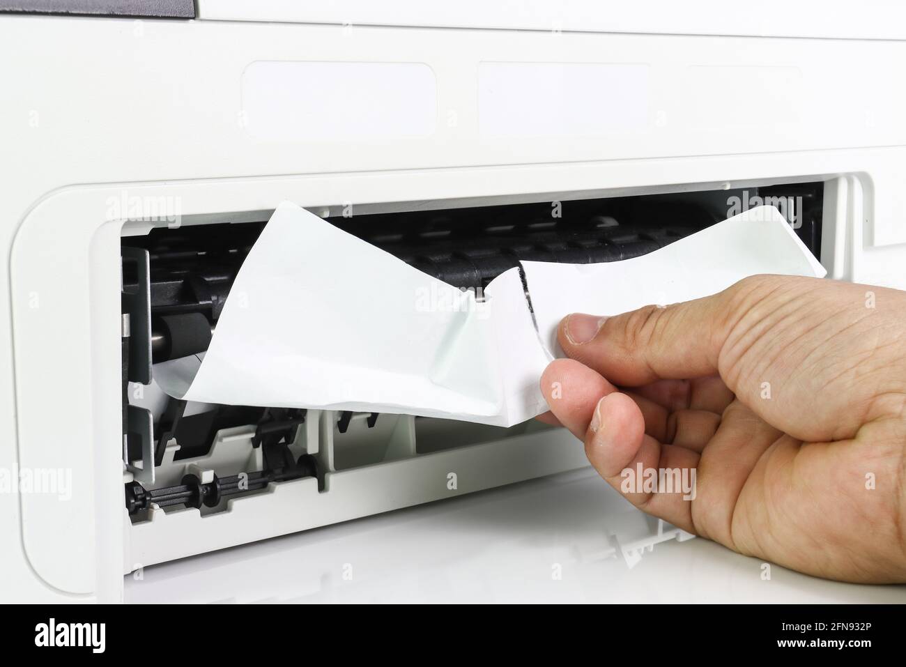 Technicians Removing Paper Stuck, Paper Jam In Printer At Office Stock