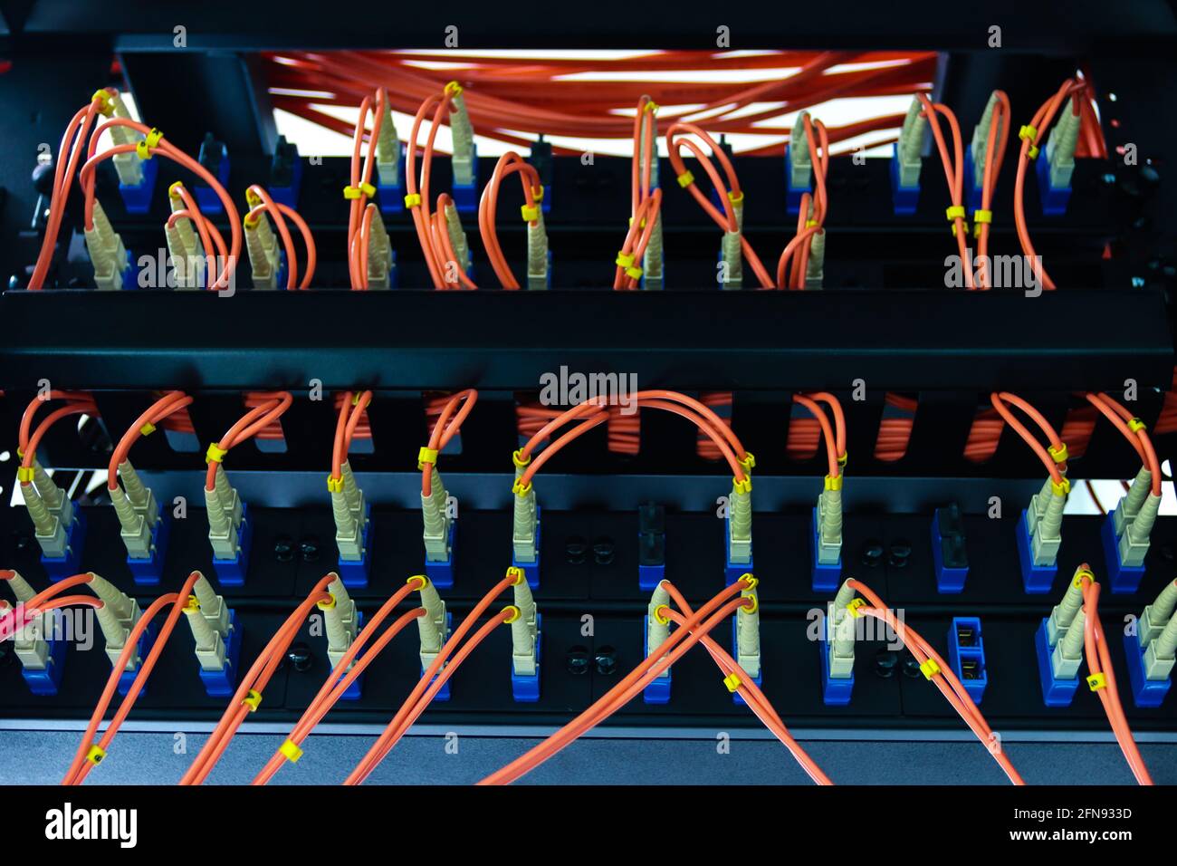 cable network, fiber optic cable connect to switch port in server room