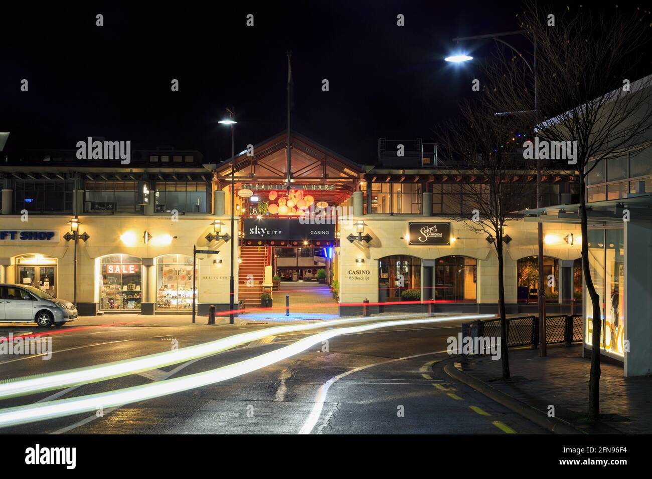 The Sky City Casino building on Steamer Wharf, Queenstown, New Zealand, at night Stock Photo