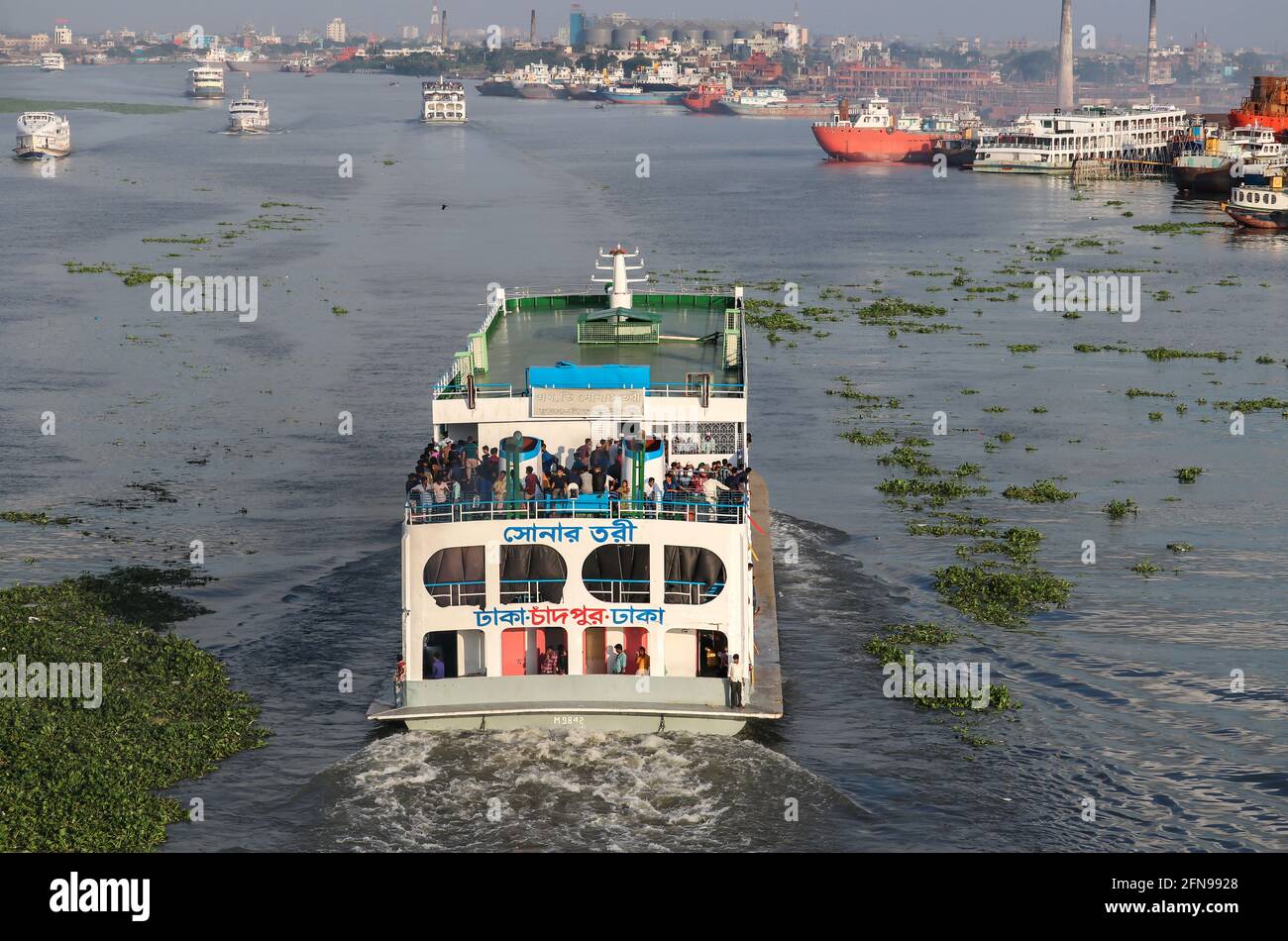 Dhaka, Bangladesh : People returning to home by overcrowded passenger ferry on the occasion of Eid al-Fitr Stock Photo