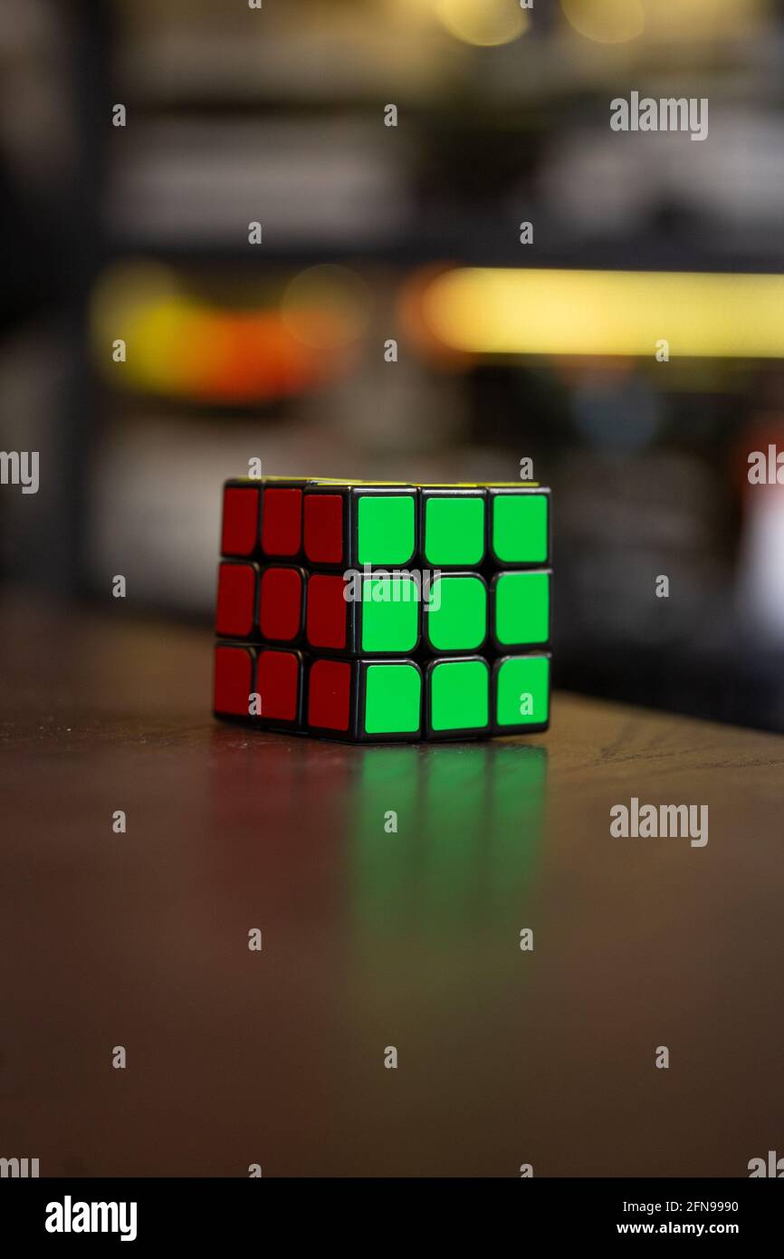 colorful rubik's cube on the table. Stock Photo