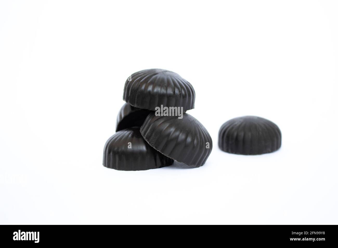 chocolate candies macro isolated on a white background Stock Photo - Alamy