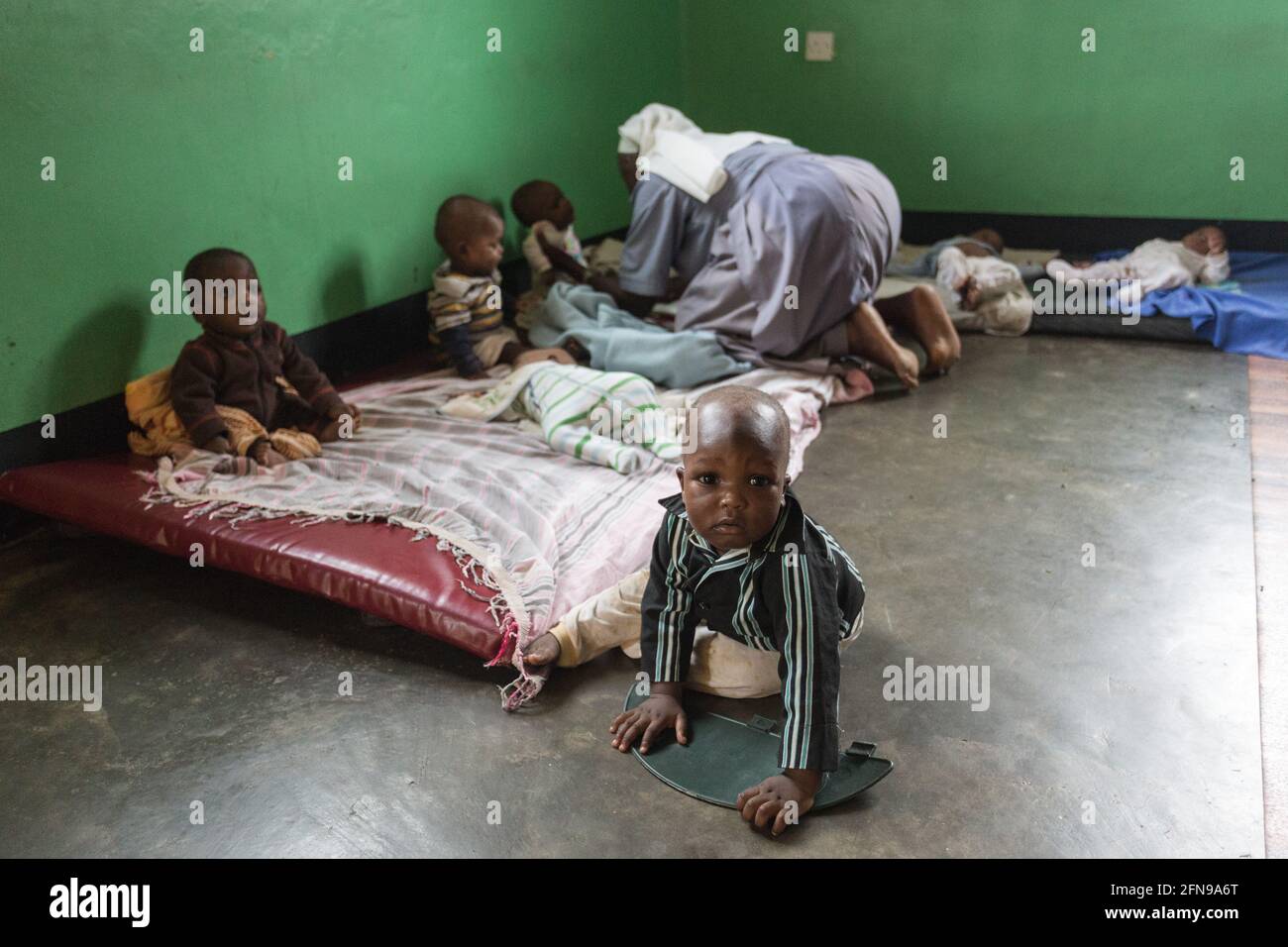 Toddlers in St Kizito orphanage in rural Eastern Uganda Stock Photo