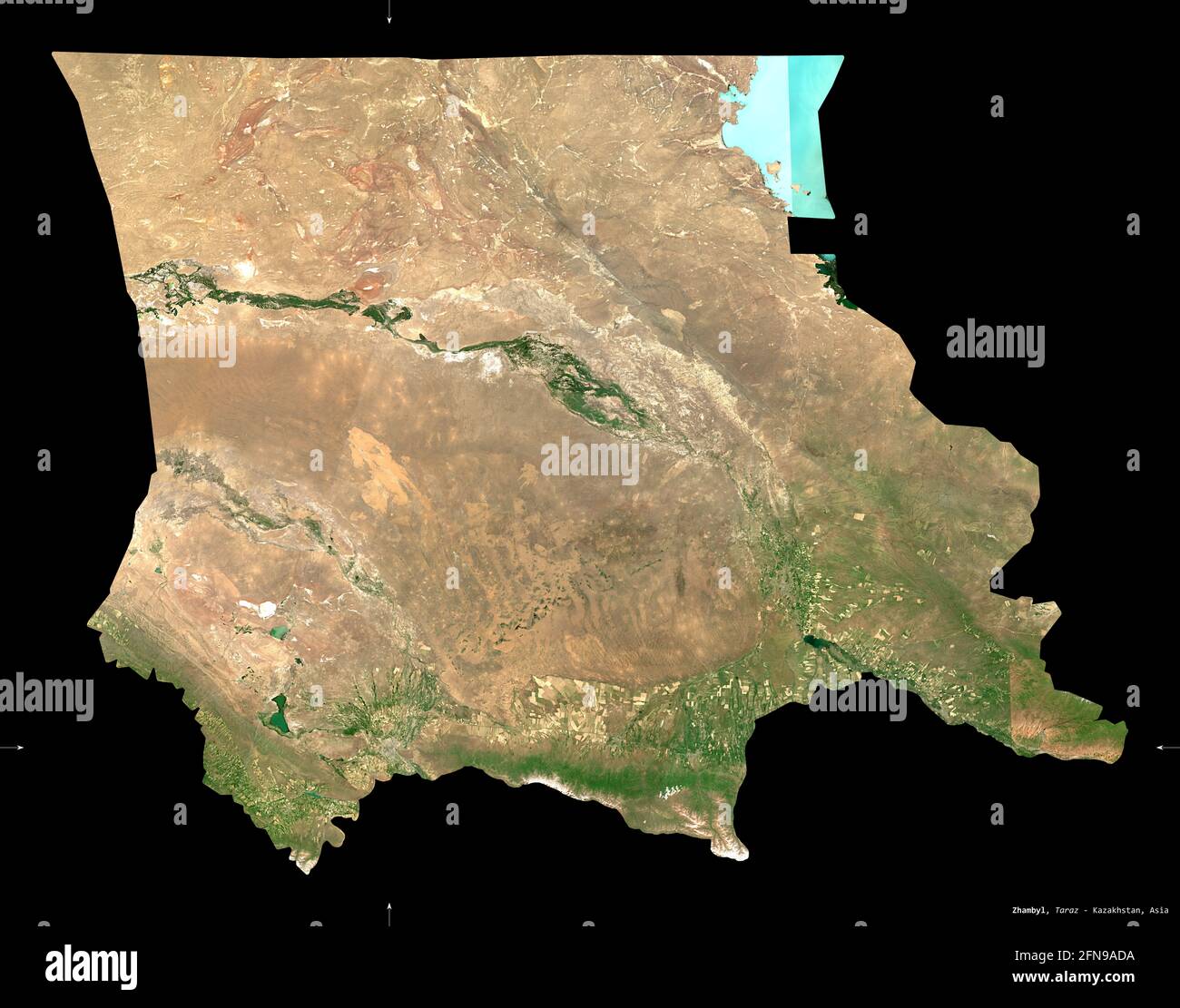 Zhambyl, region of Kazakhstan. Sentinel-2 satellite imagery. Shape isolated on black. Description, location of the capital. Contains modified Copernic Stock Photo
