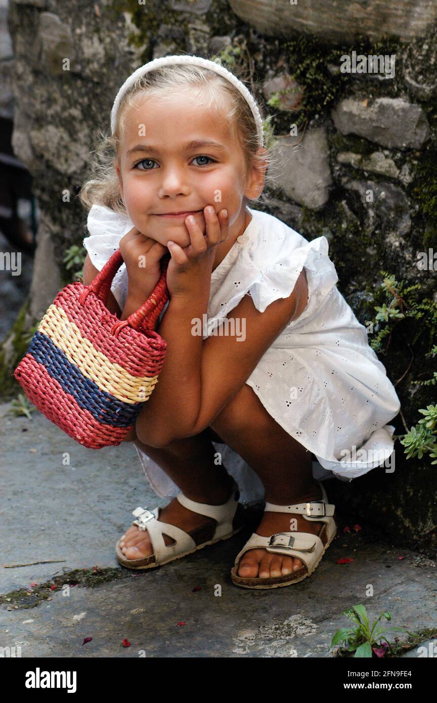 Little girl is posing, italian little girl Stock Photo - Alamy