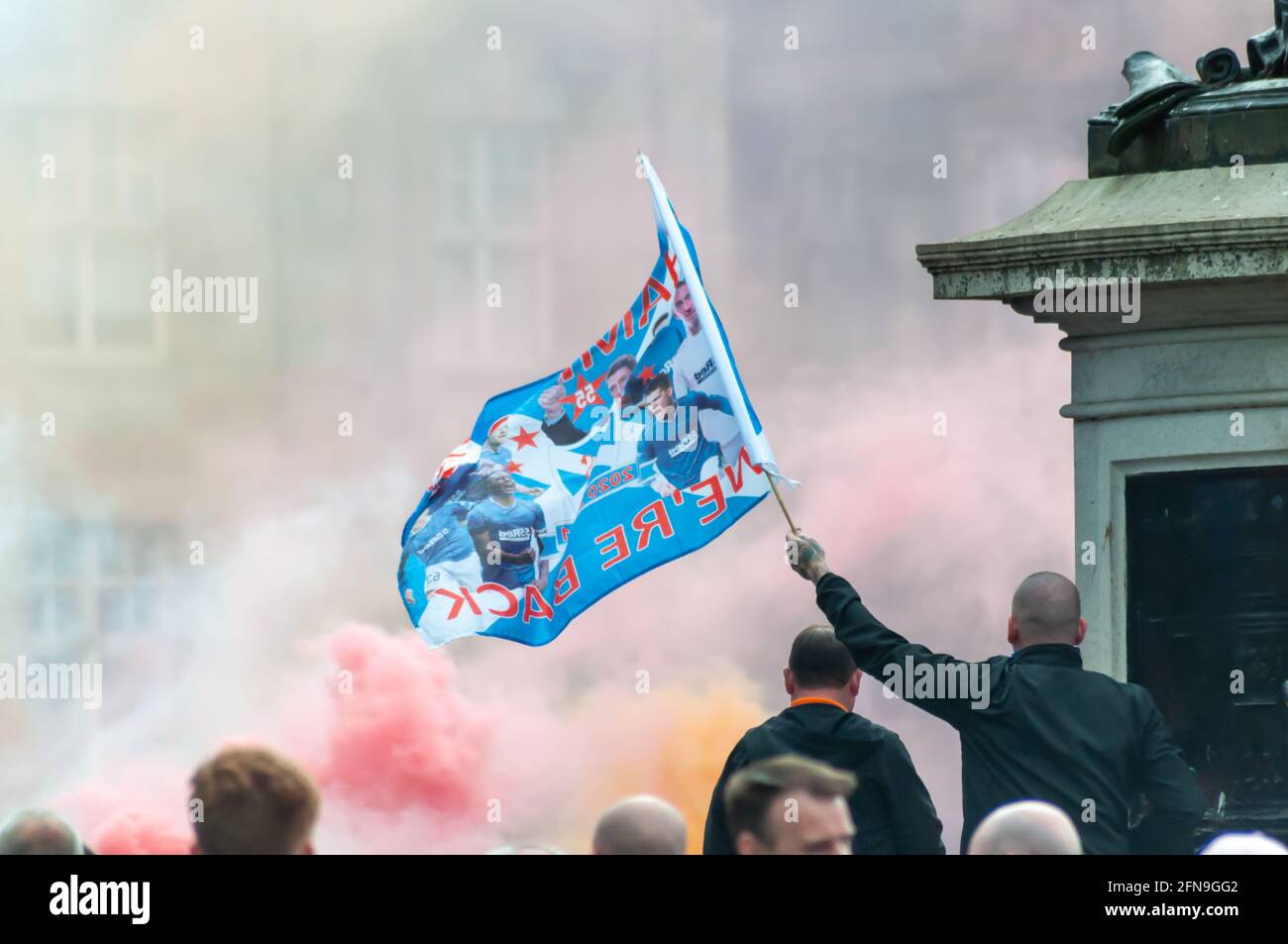 Glasgow, Scotland, UK. 15th May, 2021. Rangers fans celebrate  winning the Scottish Premiership title. Credit: Skully/Alamy Live News Stock Photo