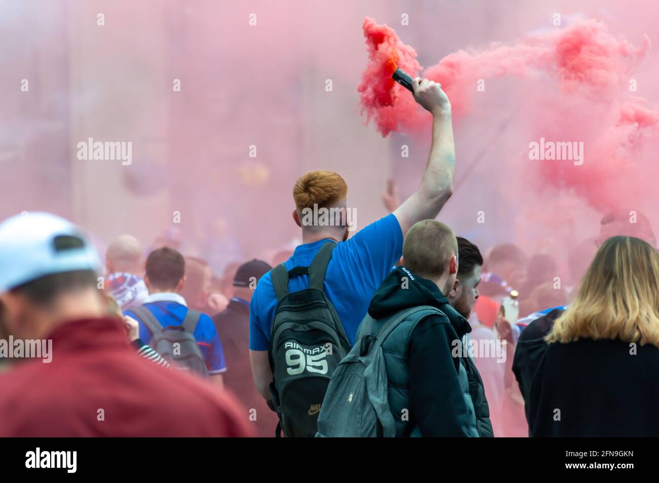 Glasgow, Scotland, UK. 15th May, 2021. Rangers fans celebrate  winning the Scottish Premiership title. Credit: Skully/Alamy Live News Stock Photo