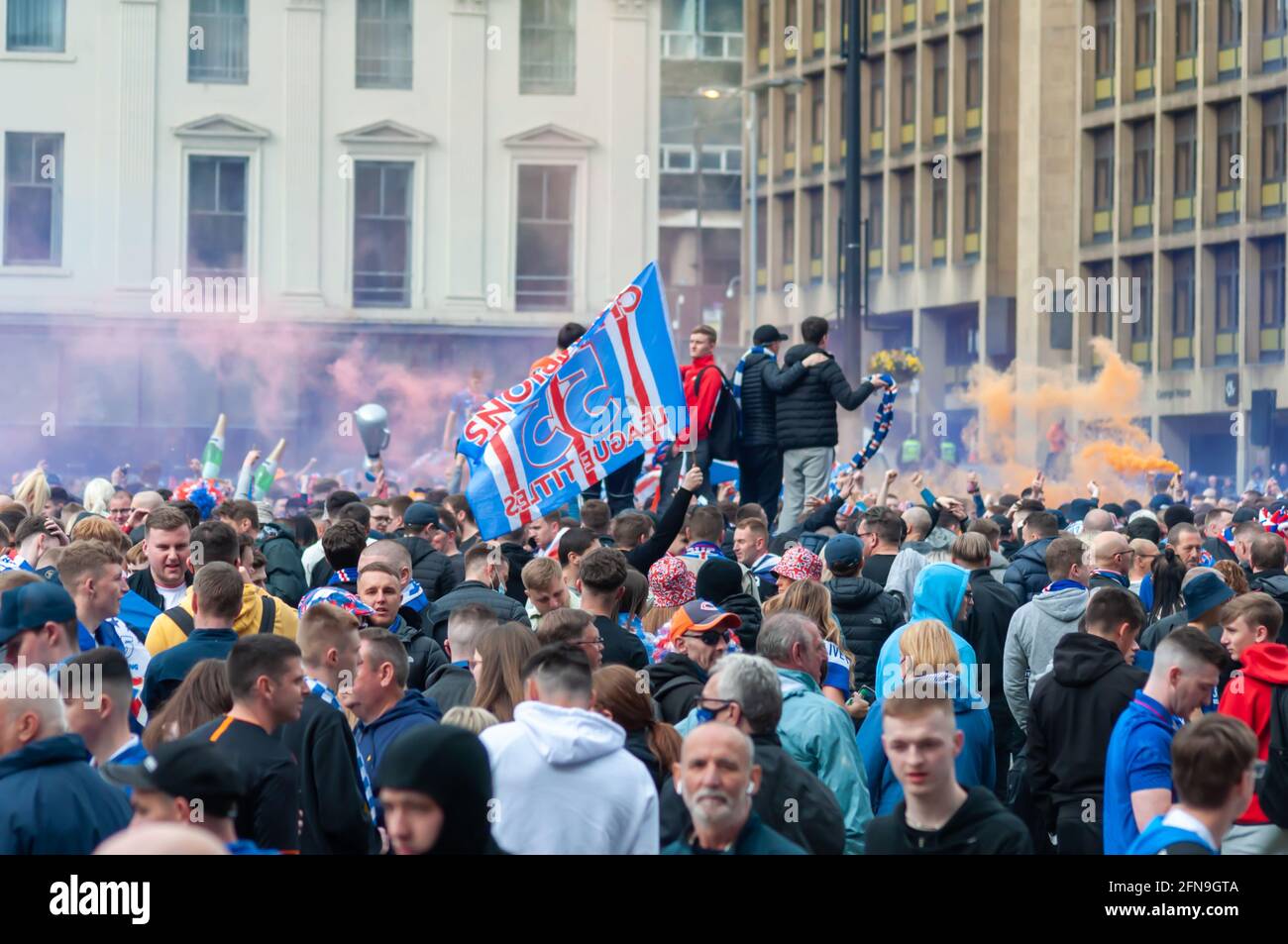 Glasgow, Scotland, UK. 15th May, 2021. Rangers fans celebrate  winning the Scottish Premiership title. Credit: Skully/Alamy Live News Stock Photo