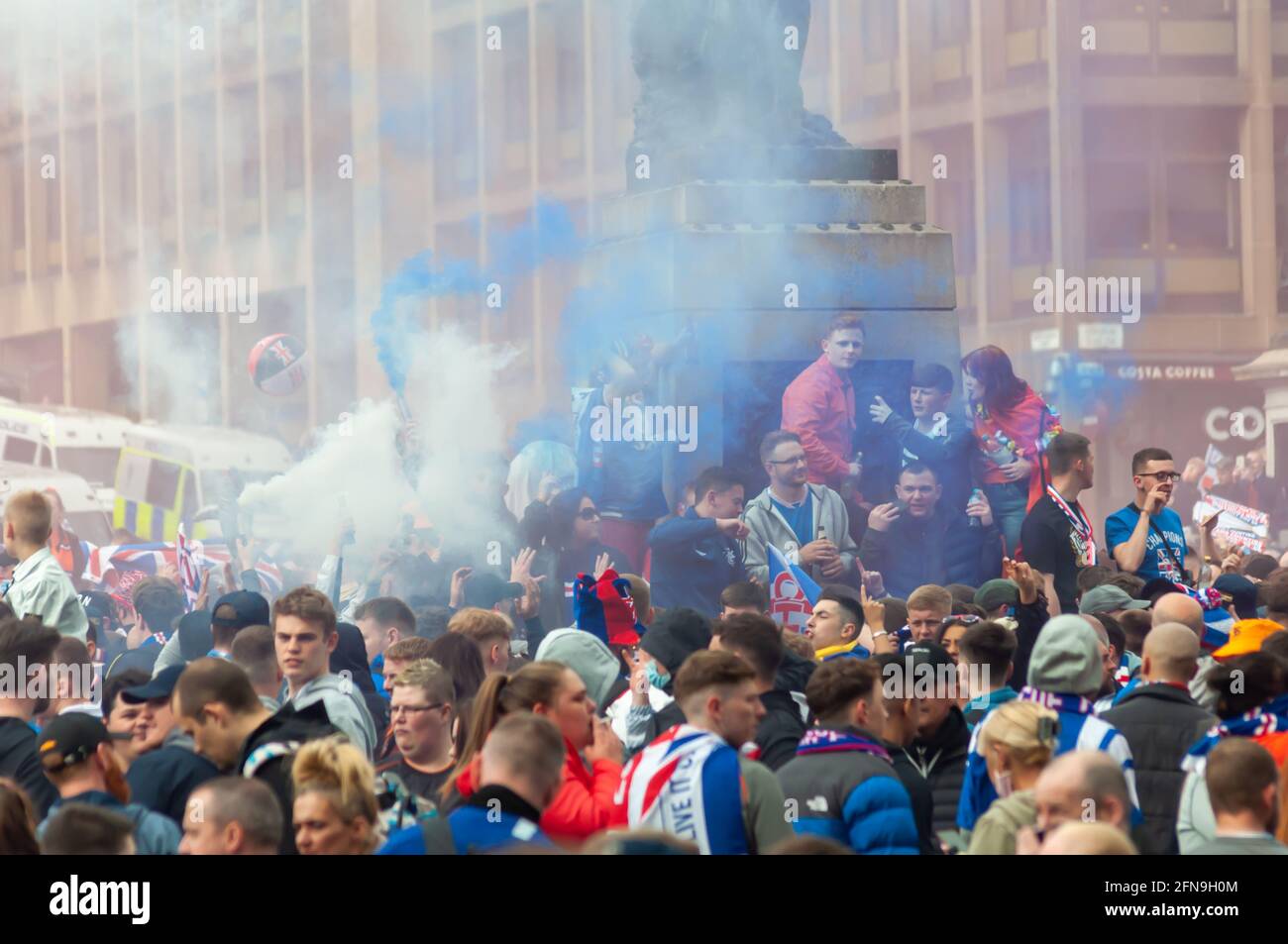 Glasgow, Scotland, UK. 15th May, 2021. Rangers fans celebrate  winning the Scottish Premiership title. Credit: Skully/Alamy Live News Stock Photo