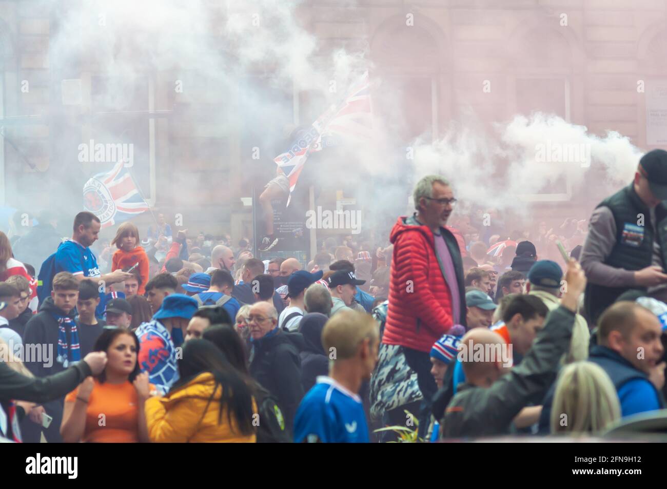 Glasgow, Scotland, UK. 15th May, 2021. Rangers fans celebrate  winning the Scottish Premiership title. Credit: Skully/Alamy Live News Stock Photo